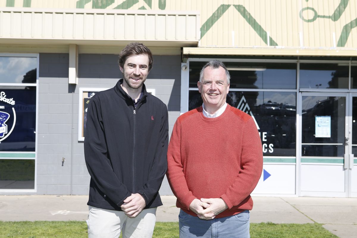 Left: Recreation Coordinator Joshua Walsh and Right: Mayor of the City of Wagga Wagga Councillor Dallas Tout. Both stand and smile in front of Bolton Park Stadium.
